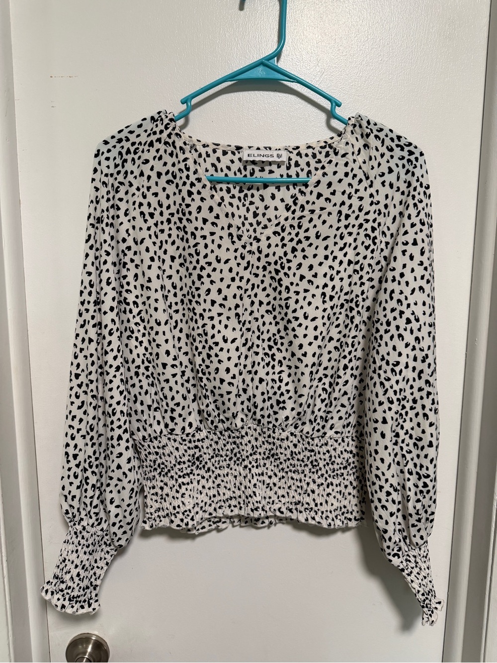 Elings Black and White Smocked Waist Blouse